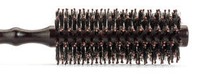 GranNaturals brush held in hand to show size and 1.75 inch barrel scale