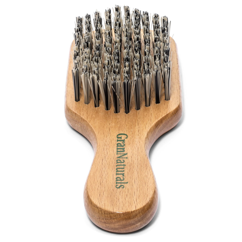 GranNaturals front view of hard-bristle brush showing shape and firm bristles for smoothing