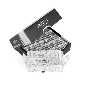 GRAVITY RAZORS barber using blade in shave service showing professional performance benefit