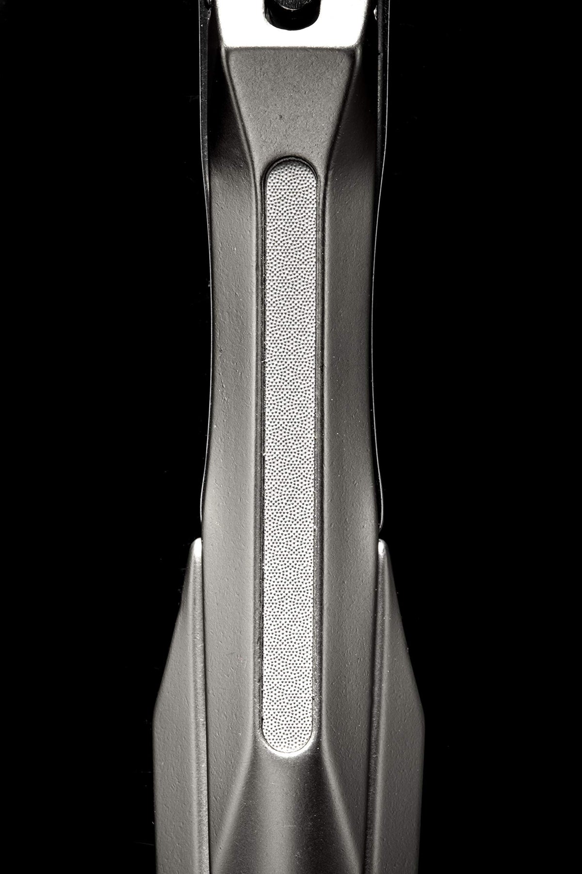 Green Bell Takumi No Waza next to ruler showing 13mm jaw scale accuracy