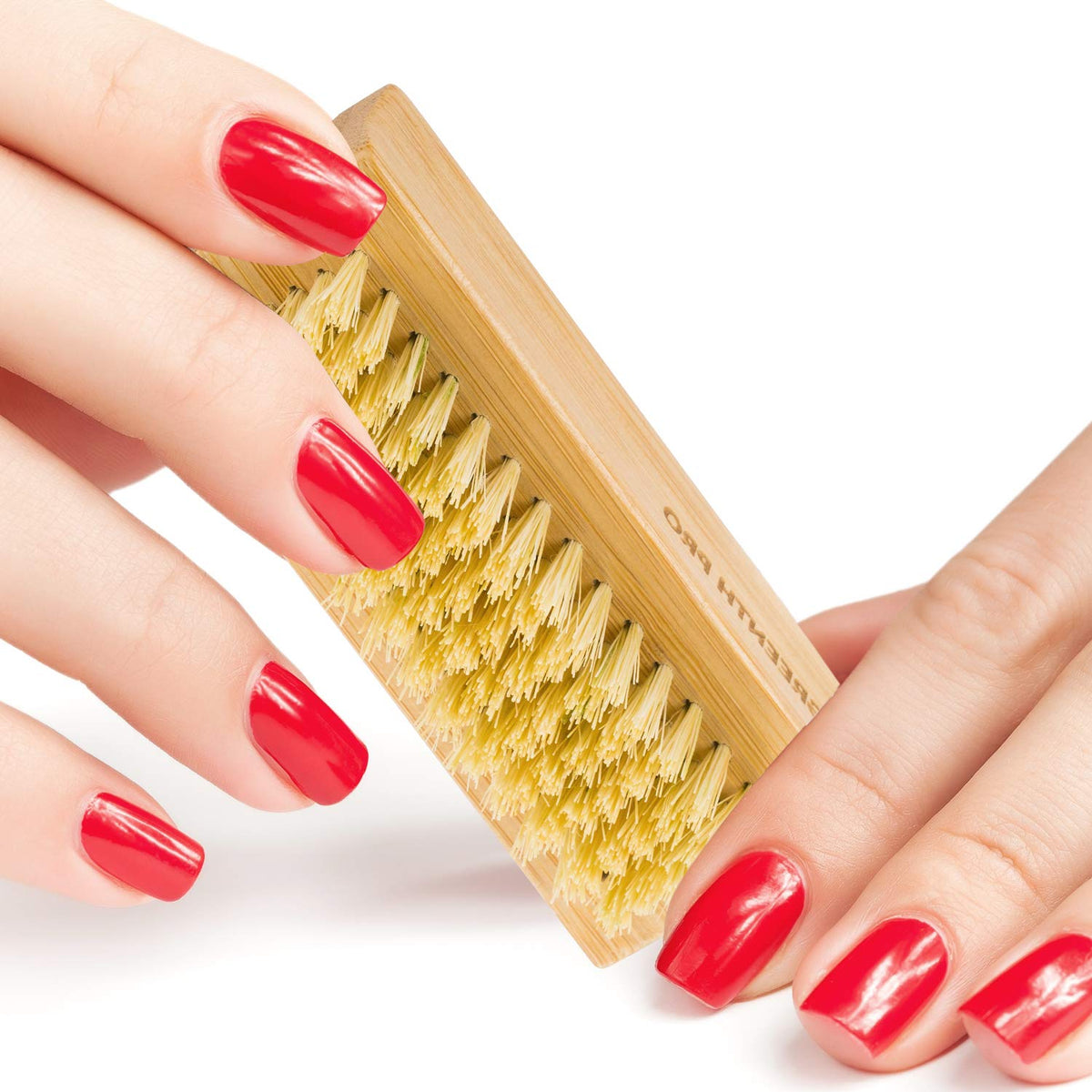 GREENTH PRO brush held in hand to show size, easy travel storage