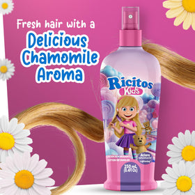 Grisi Ricitos used while a child brushes hair demonstrating tear-free combing benefit