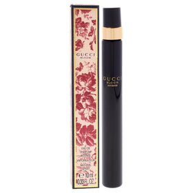 Gucci Bloom atomizer spraying mist for quick on-the-go refresh