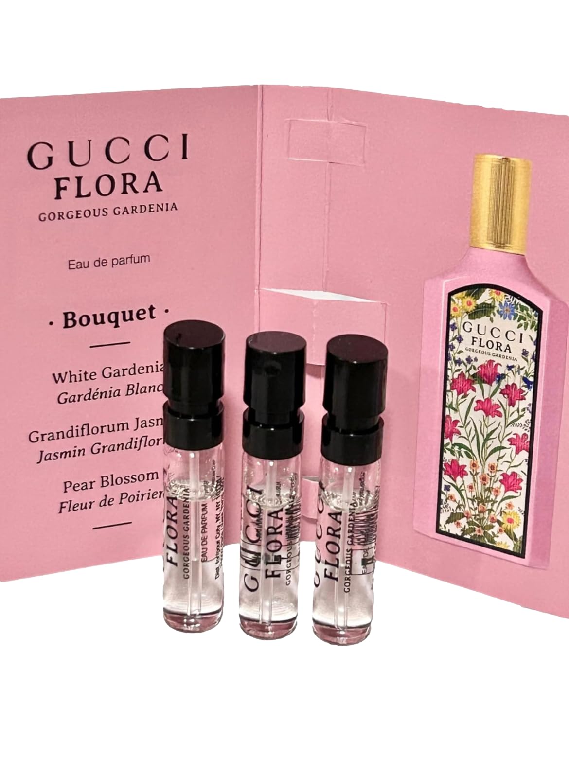 Gucci Flora Gorgeous Gardenia travel lifestyle with mini sprays in a purse for convenience