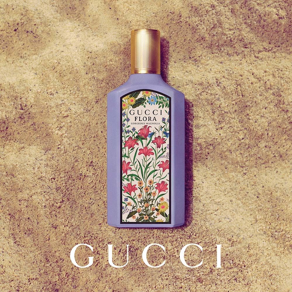Hand spraying Gucci Flora Gorgeous Magnolia to show application and mist