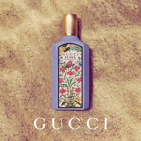 Hand spraying Gucci Flora Gorgeous Magnolia to show application and mist