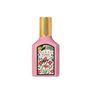Gucci perfume being sprayed on wrist showing effortless refresh benefit