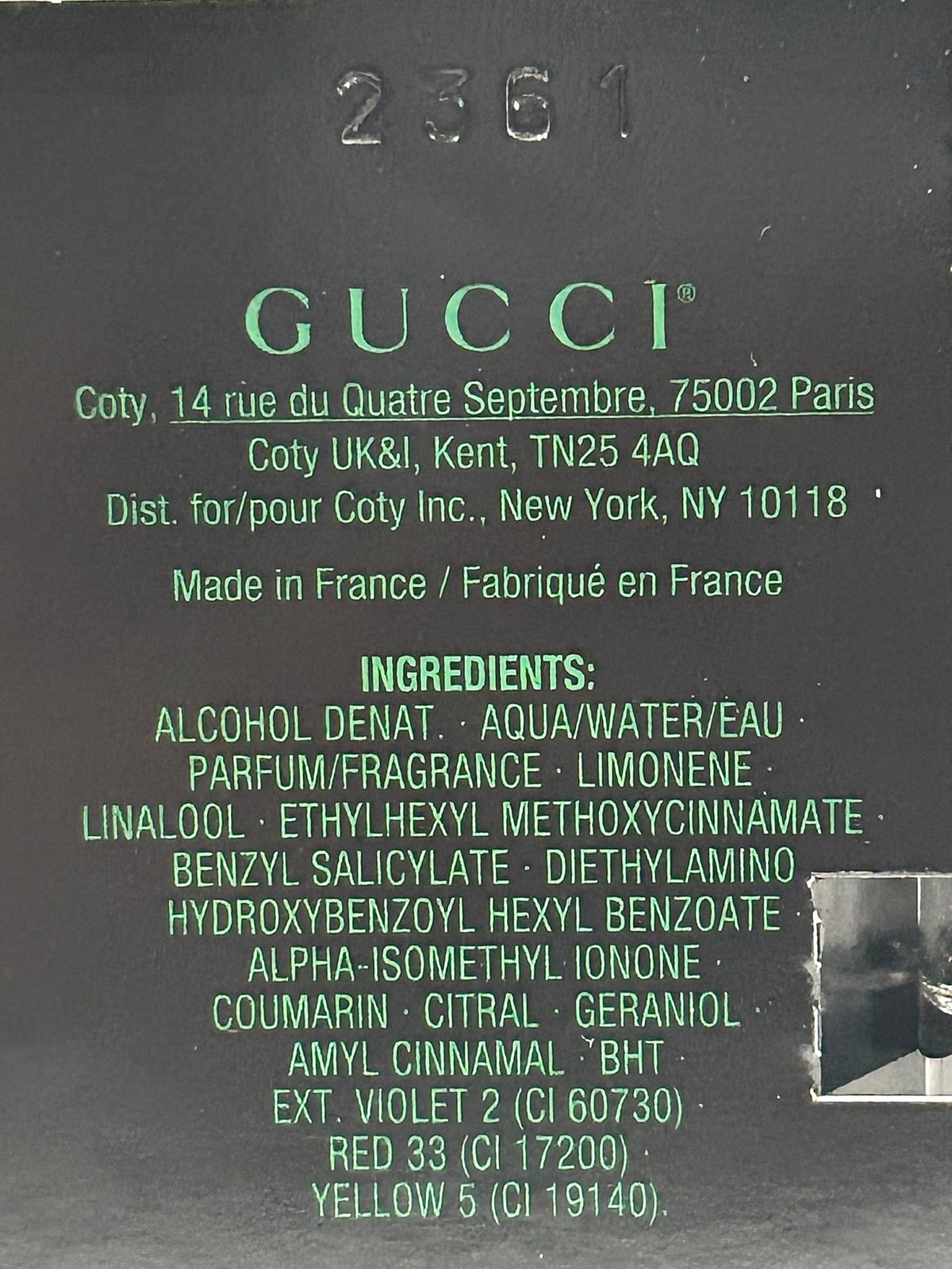 Gucci Guilty Black placed inside a travel kit demonstrating portable refresh benefit
