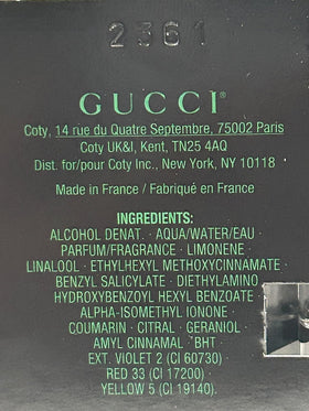Gucci Guilty Black placed inside a travel kit demonstrating portable refresh benefit