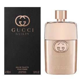 Gucci Guilty side detail highlighting glass texture and label clarity