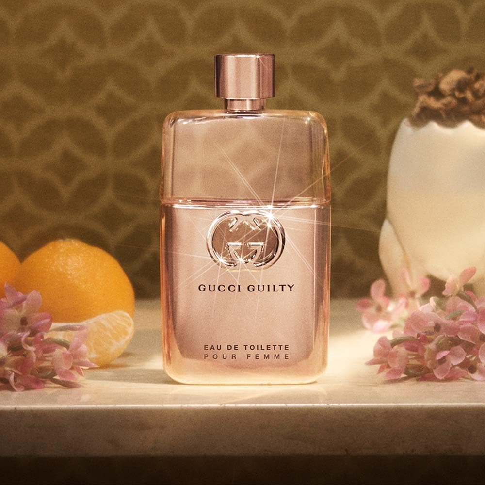 Gucci Guilty on a dresser in a lifestyle scene suggesting daily wear benefit