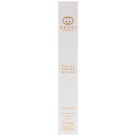 Hand holding Gucci Guilty Pour Femme Intense mini spray to show practical in-hand use and on-the-go freshness