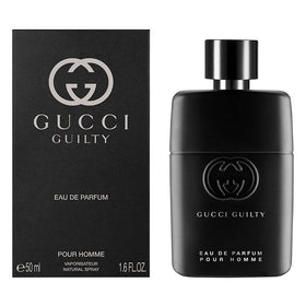 Gucci Guilty box beside bottle highlighting authentic packaging and brand presentation