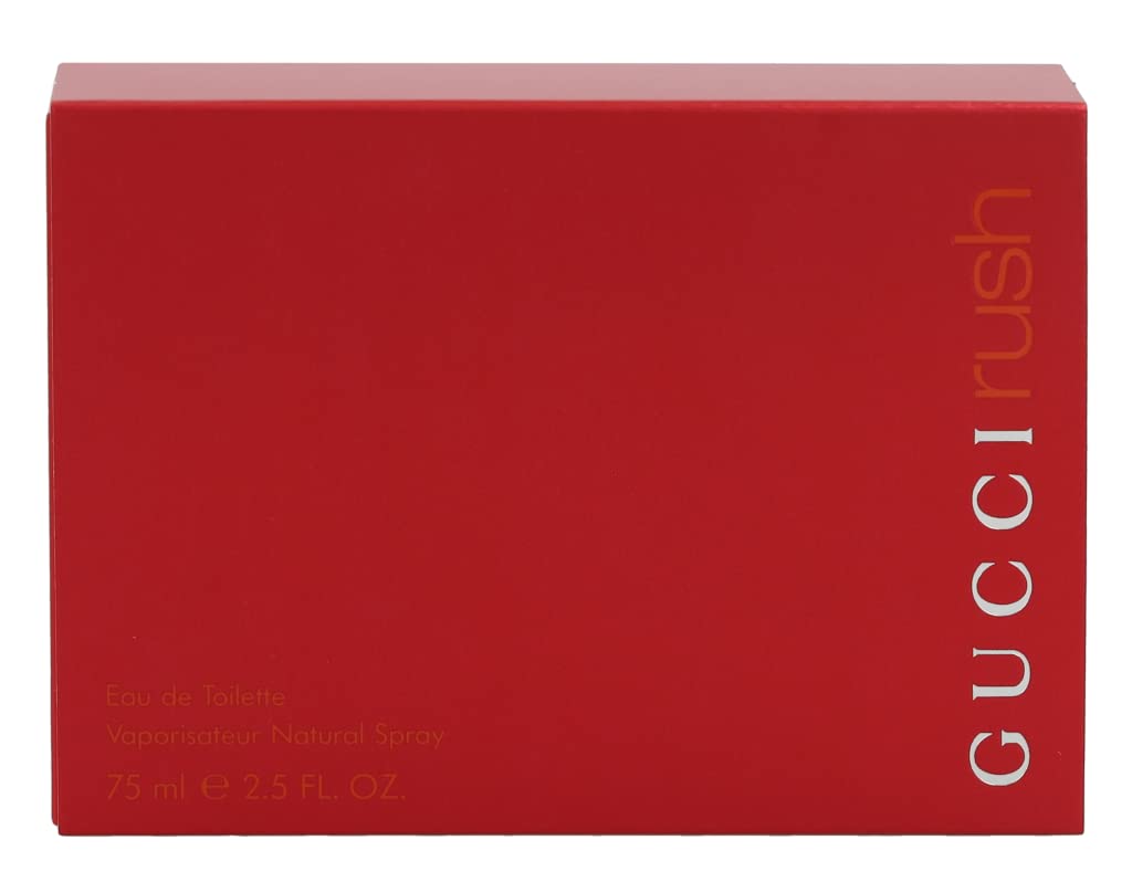 Gucci Rush spray mist closeup capturing fragrance release, demonstrates fine atomizer benefit