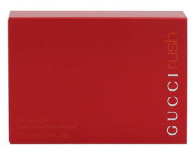 Gucci Rush spray mist closeup capturing fragrance release, demonstrates fine atomizer benefit