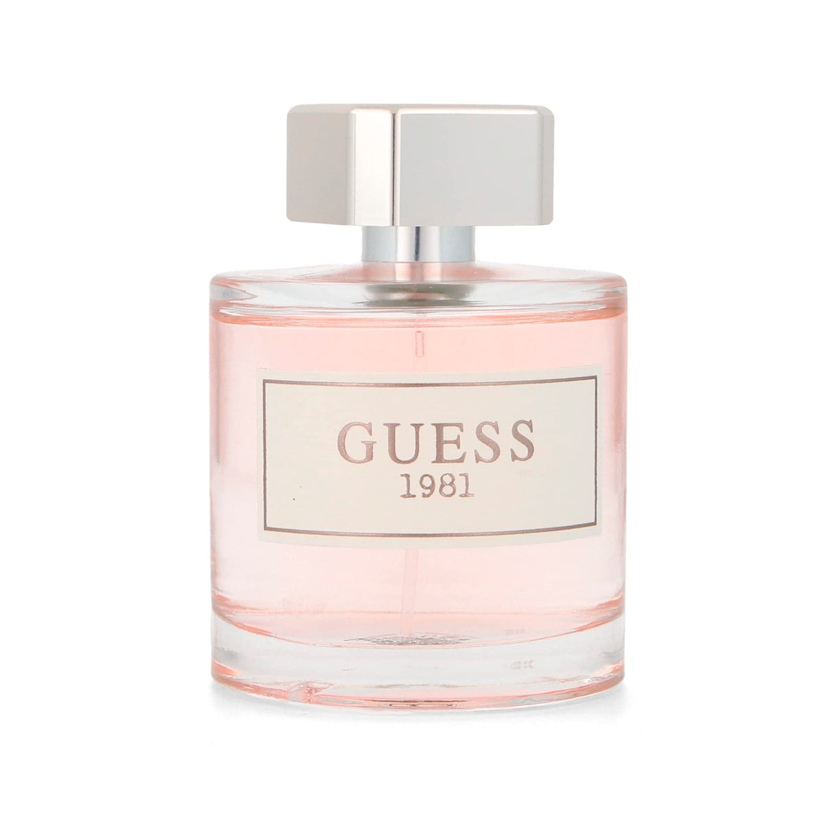 GUESS 1981 being sprayed on wrist, demonstrating easy application and fresh scent
