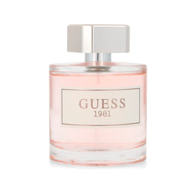 GUESS 1981 being sprayed on wrist, demonstrating easy application and fresh scent