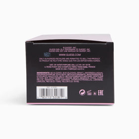 GUESS wrapped gift setup presenting perfume as ready-to-give present