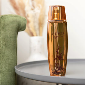 GUESS Marciano bottle cap detail emphasizing quality finish and secure closure