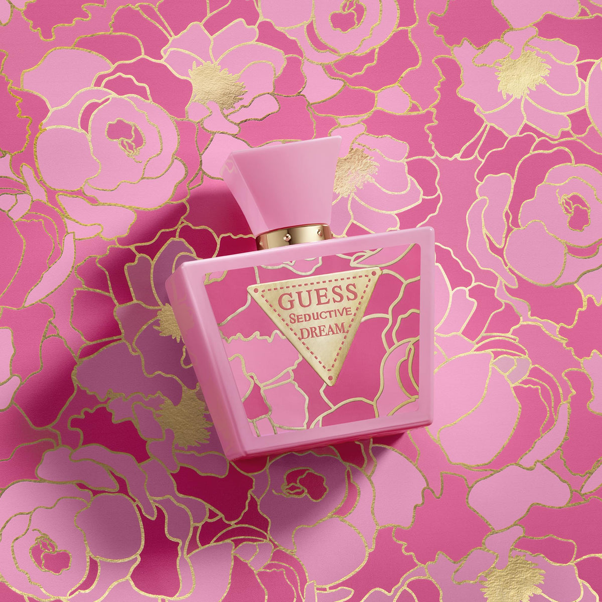 GUESS fragrance liquid poured into a dish, showing color and clarity benefits