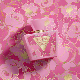 GUESS fragrance liquid poured into a dish, showing color and clarity benefits