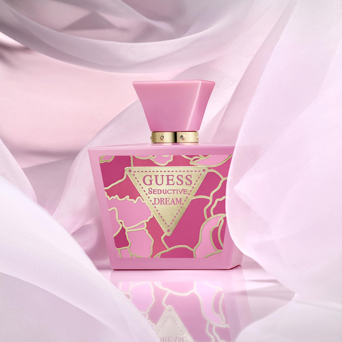 GUESS perfume displayed on vanity with accessories, conveying stylish daily use