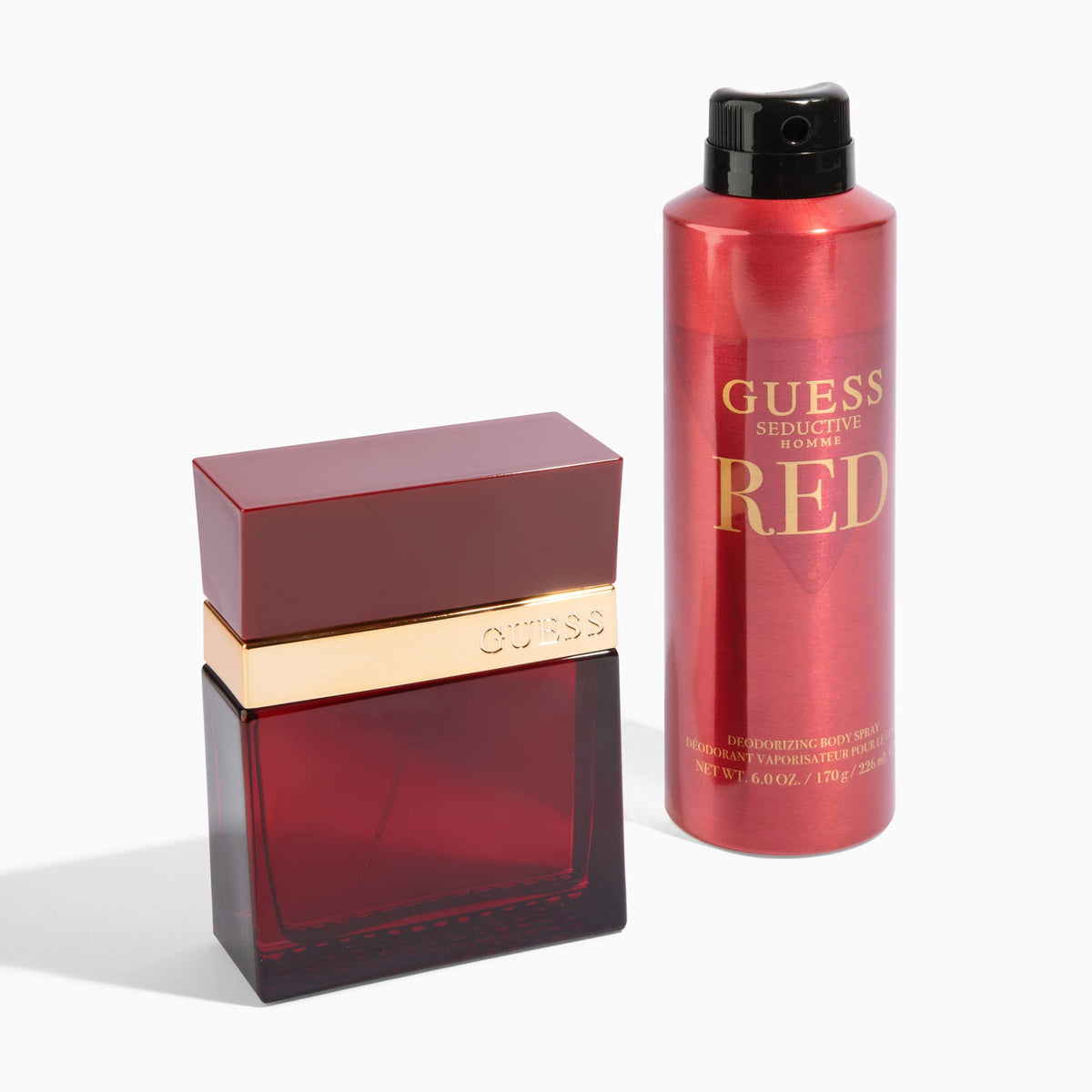 GUESS Seductive Red in hand to display 3.4 oz size and real-world scale