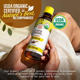 Drop of GuruNanda castor oil texture on fingertip demonstrating rich hydration