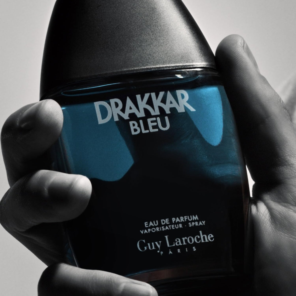 Guy Laroche Drakkar Bleu on bathroom vanity with grooming items showing everyday wearability