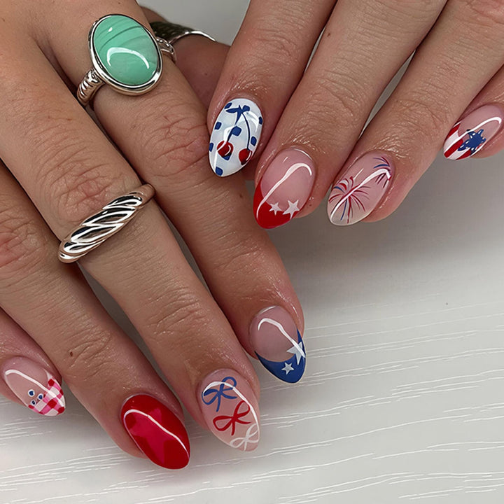 GXOIPNS front packaging showing 24-piece patriotic press-on nails set and tools
