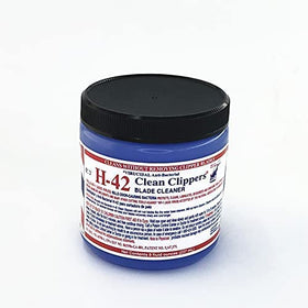 H-42 cleaner applied to clipper blade demonstrating fast debris removal and hygiene
