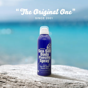 H2Ocean bottle beside a ruler to show 6 oz size and travel-friendly scale