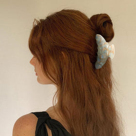 HAIMEIKANG four clips laid flat showing pattern variety and handcrafted look