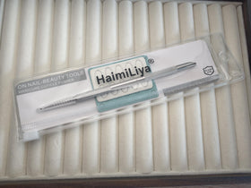 HaimiLiya tool beside ruler showing compact size for travel and storage benefit
