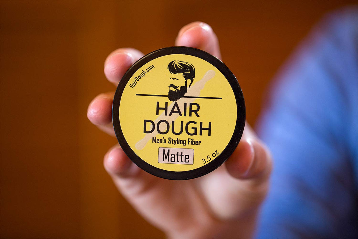 Hair Dough rinsing out under water to show easy washout benefit