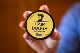 Hair Dough rinsing out under water to show easy washout benefit
