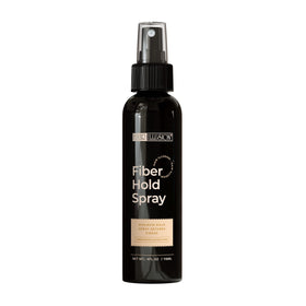 hair illusion holding spray bottle next to fibers to lock in coverage benefit