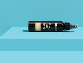 Hair Illusion spray forming fine mist over fibers for stronger hold benefit