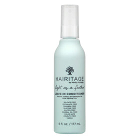Hairitage bottle front showing label and cherry amber scent, easy visual identification