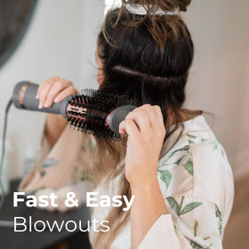 Hairitage bristles and handle detail showing ergonomic grip for controlled styling