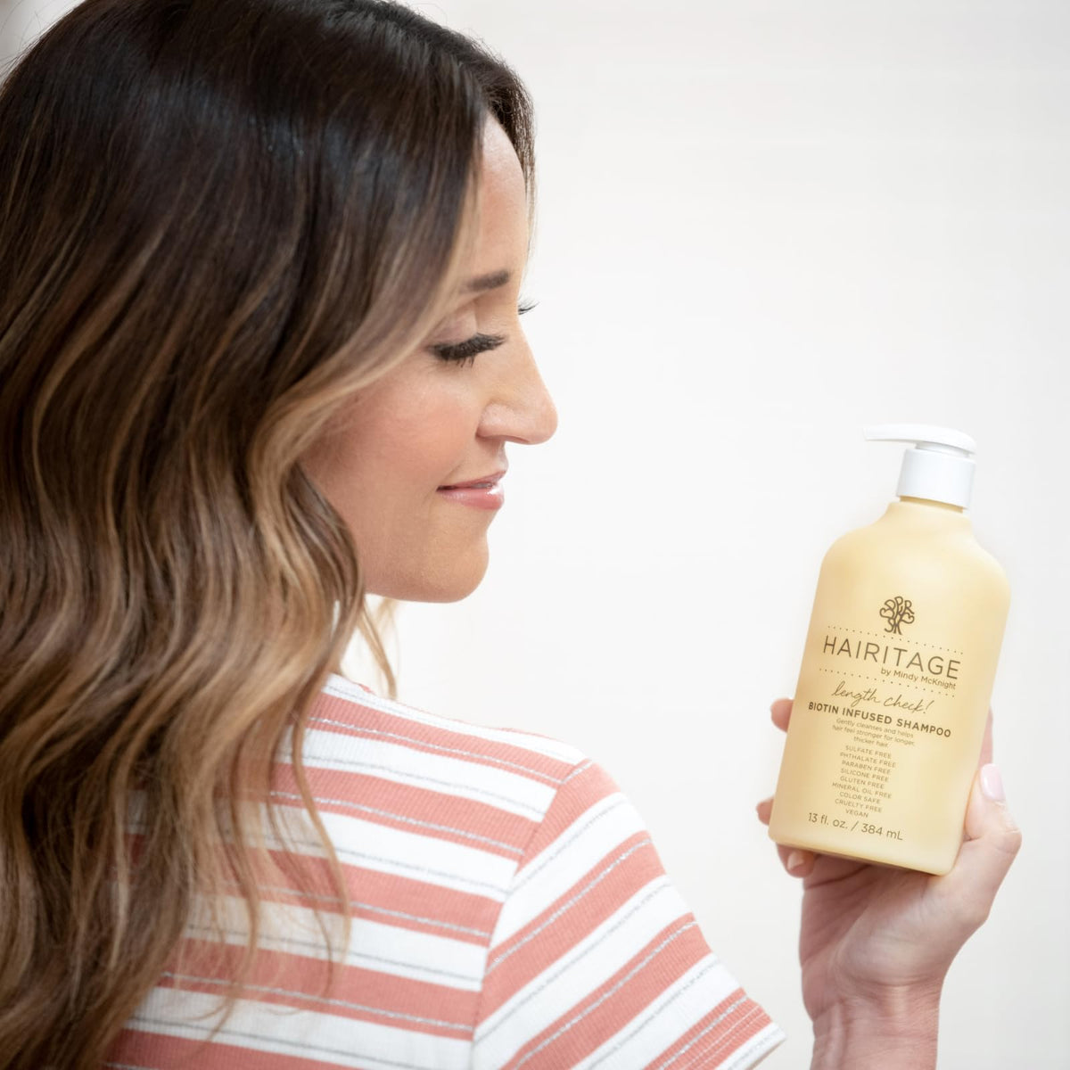 Hairitage foam texture in palm highlights gentle lathering and lightweight cleansing