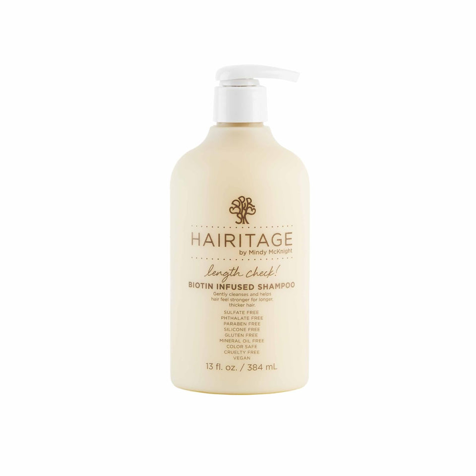 Hairitage front bottle showing label and volume for clear product identification and benefit