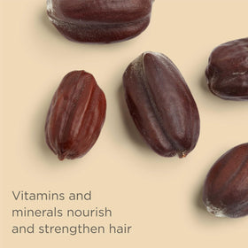 Hairitage shampoo on wet hair showing cleansing action and hydrated look