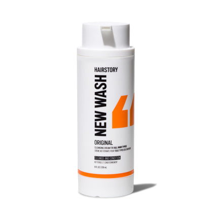 Hairstory New Wash front bottle showing label and refillable design benefit