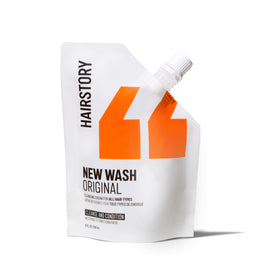 Hairstory New Wash refill pouch front view showing product branding and size benefit