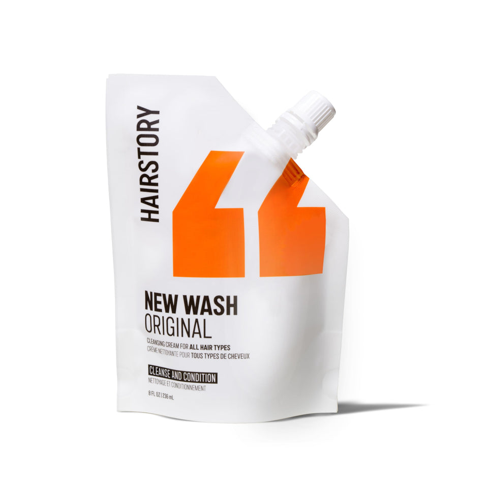 Hairstory New Wash refill pouch front view showing product branding and size benefit
