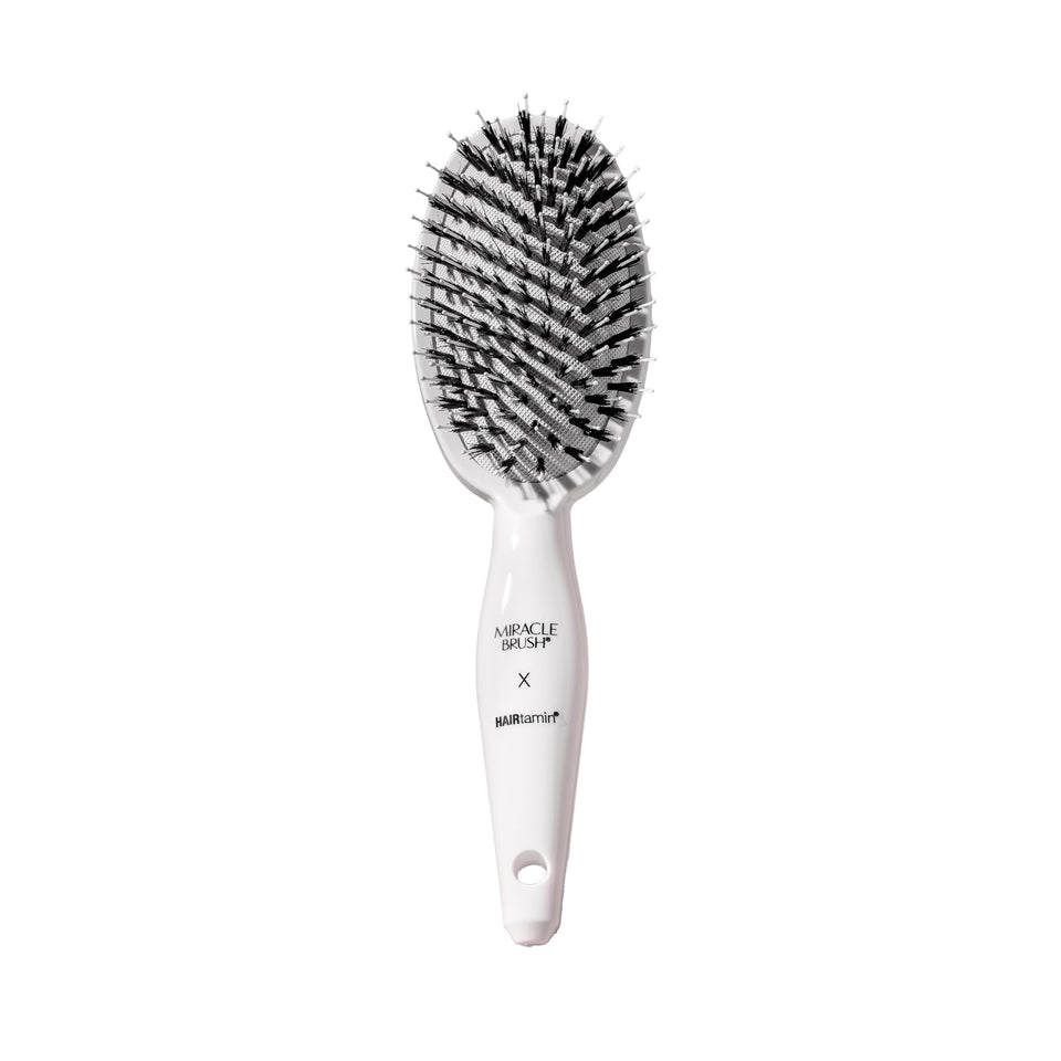 HAIRtamin Miracle Brush front view showing paddle design and smooth finish