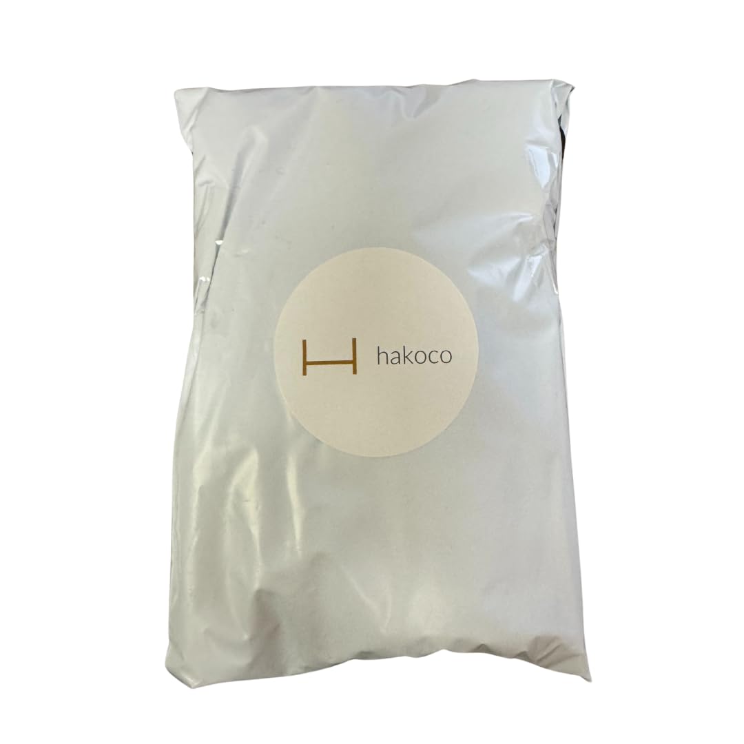 HAKOCO KOSE in-hand use demonstrating pump application, quick makeup removal