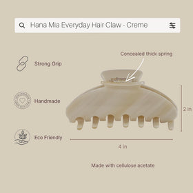 Hana Mia claw clip held in hand to show large 4 inch scale and ease