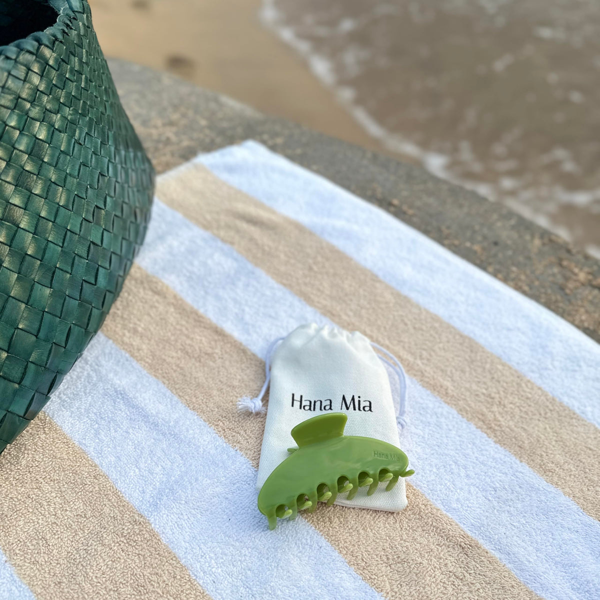 Hana Mia shown in hand for scale, demonstrates large four-inch capacity